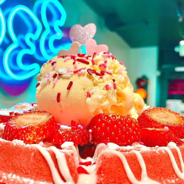 Beeps Diner's strawberry waffle with vanilla ice cream, sprinkles, and fresh strawberries.